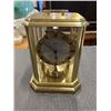 Image 2 : BRASS GERMAN CAROUSEL CLOCK AND HAMMERED COPPER POT