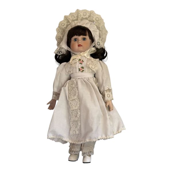GIRL DOLL WITH MUSICAL WIND-UP