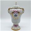 Image 1 : Porcelain Lidded Urn with Pierced Design, Floral Accents