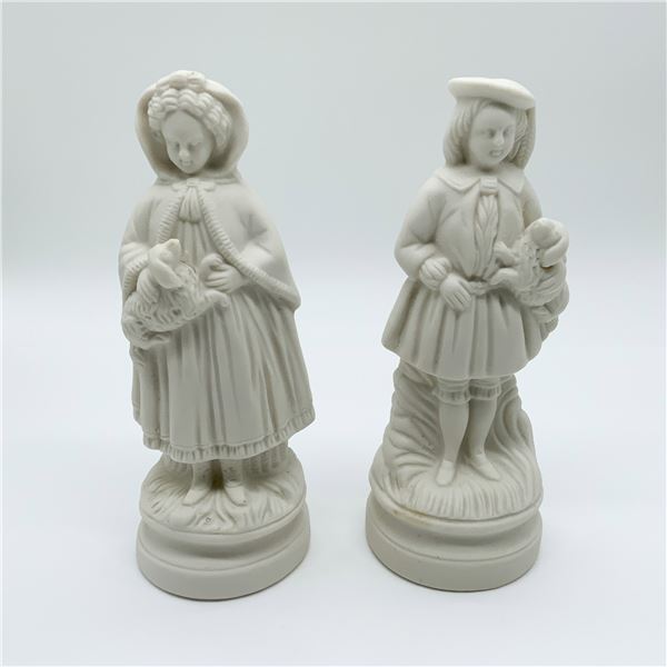 Pair of Bisque Porcelain Figurines
