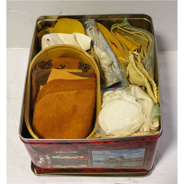 LARGE TIN FULL OF LEATHER AND CRAFTING MATERIALS