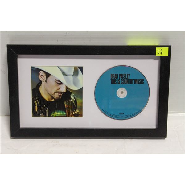 AUTOGRAPHED BRAD PAISLEY FRAMED CD AND