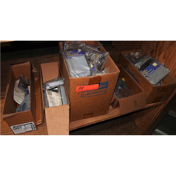 Contents of Shelf: Carlton Blank Outdoor Covers, 20 Amp Outlet Covers, Hardware, etc