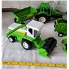 Image 2 : Group of farm equipment toys.