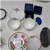 Image 2 : china tea cups,plates ,mini wedding bells and human-like figurine