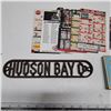 Image 3 : cast iron hudson bay sign , players empty tin, and sports magnets for fridge