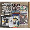 Image 1 : Sports Collector lot. SI Hardcover coffee table book. Oilers matted photo. Flames Calander. Other si