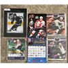 Image 2 : Sports Collector lot. SI Hardcover coffee table book. Oilers matted photo. Flames Calander. Other si