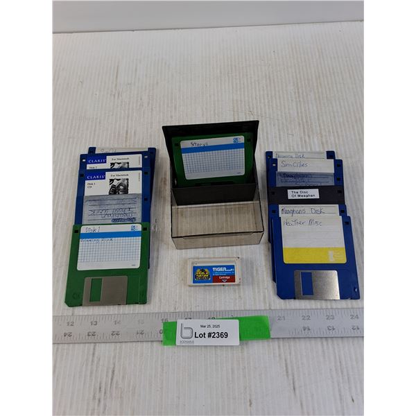 Miscellaneouys 5 1/4 Inch Computer Diskettes in Case and a Tiger Electronics Wheel of Fortune Game C