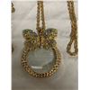 Image 3 : 2 Magnifying Glass Necklaces: Dog & Butterfly Themed