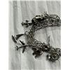 Image 2 : Sterling Silver Stamped Charm Bracelet With 12 Charms