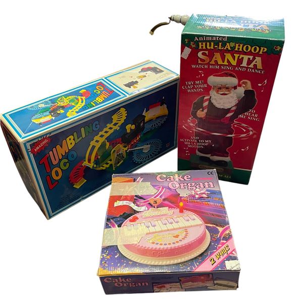 Collection of 3 Vintage Toys Cake Organ, Tumbling Loco and Hu-La Hoops Santa