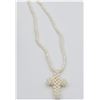 Image 2 : Freshwater Pearl 4.5-2.5mm Cross Necklace, W/A $995.00.