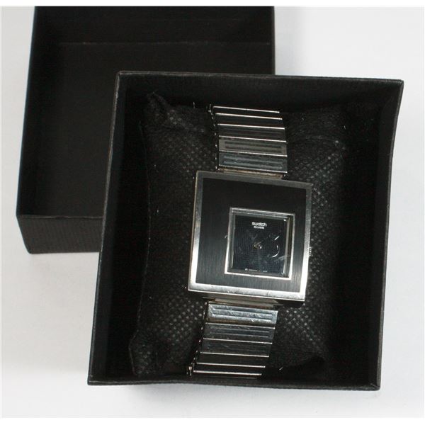 SWATCH STAINLESS STEEL SWISS STRETCH BAND WRIST