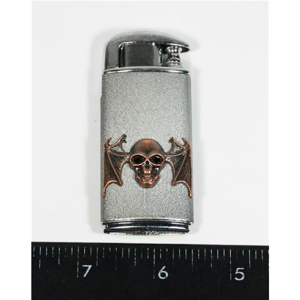 LIGHTER WITH SKULL ON IT