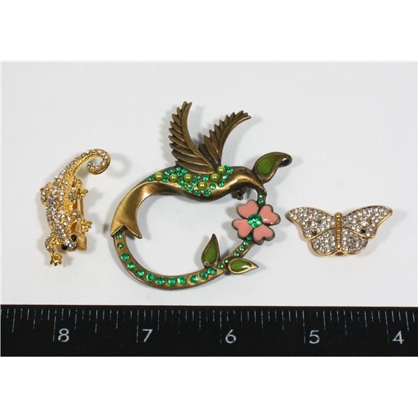 THREE RHINESTONE ACCENTED ANIMAL THEME