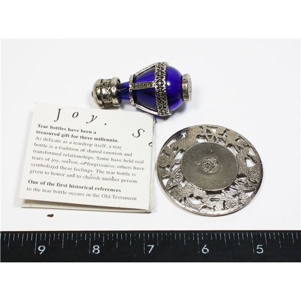 TIMELESS TRADITION THE TEAR BOTTLE AND PLATE