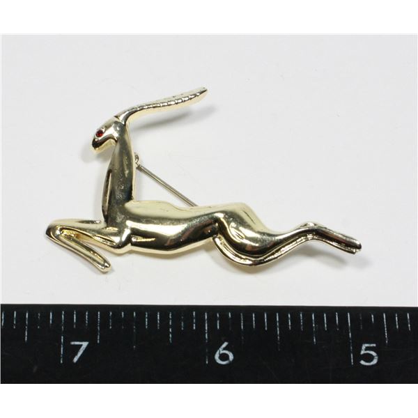 IMPALA BROOCH. RHINESTONE ACCENT EYE