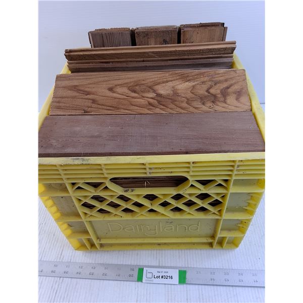 Milk Crate full of 1 Foot Pieces of Tongue and Groove Wood.