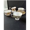 Image 2 : Assorted Tea Cups and a Cream Dispenser