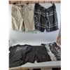 Image 1 : Hurley M T-Shirt, Vans Shorts, MMA, Quiksilver and unknown Shorts