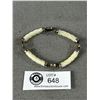 Image 1 : Vintage Carved Genuine Mother of Pearl Bracelet.