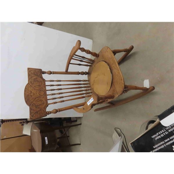Antique Press Back Rocking Chair with Lions Head 