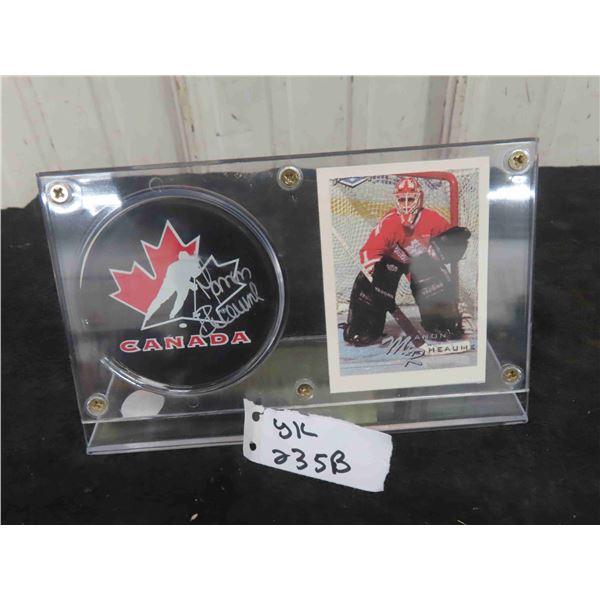 Manon Rheaume Autographed Team Canada Puck 