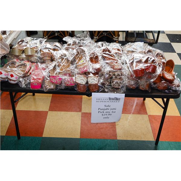 SMALL TABLE W/ LARGE LOT OF GENUINE LEATHER