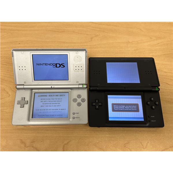 2 Nintendo DS Light Handheld Units & One charger - not tested, see all photos