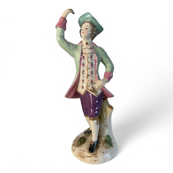 COLONIAL MAN FIGURINE