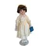 Image 1 : MARIAN YU PORCELAIN DOLL B