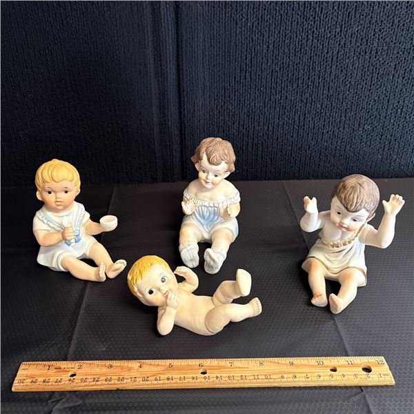 LOT OF 4 PIANO BABIES