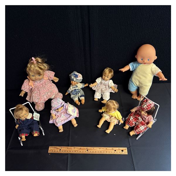 LOT OF 8 USED DOLLS