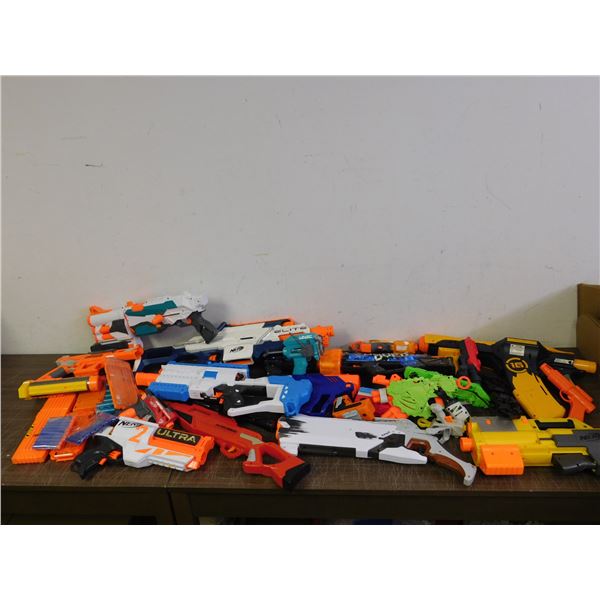 LARGE LOT of NERF Guns Assorted Styles, some darts, some packs.