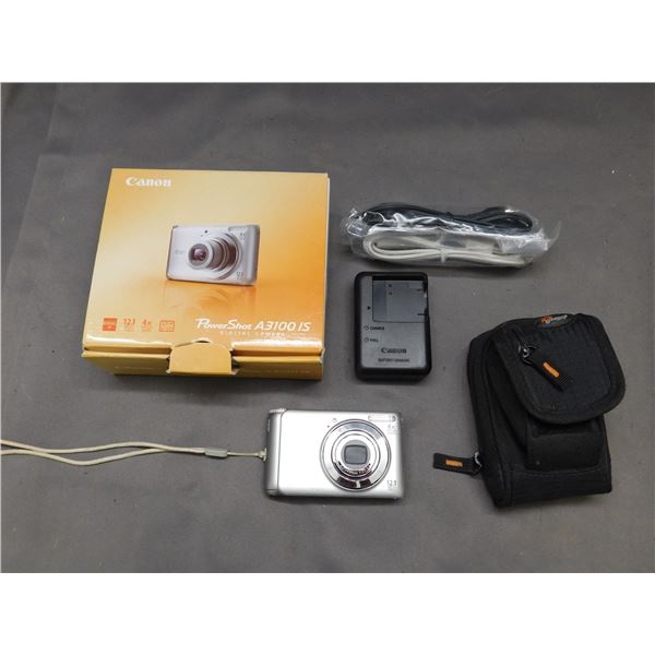 Canon Powershot A3100 IS Digital Camera w accessories, box, charger.