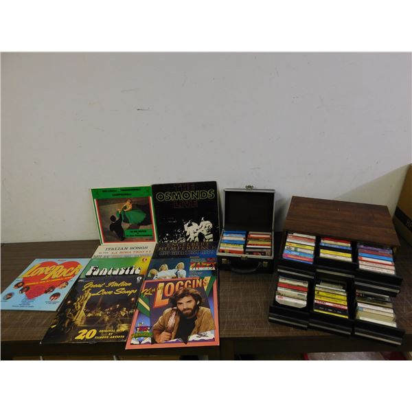 3 Cassette Tape Holders filled with random tapes along with 9 Records.
