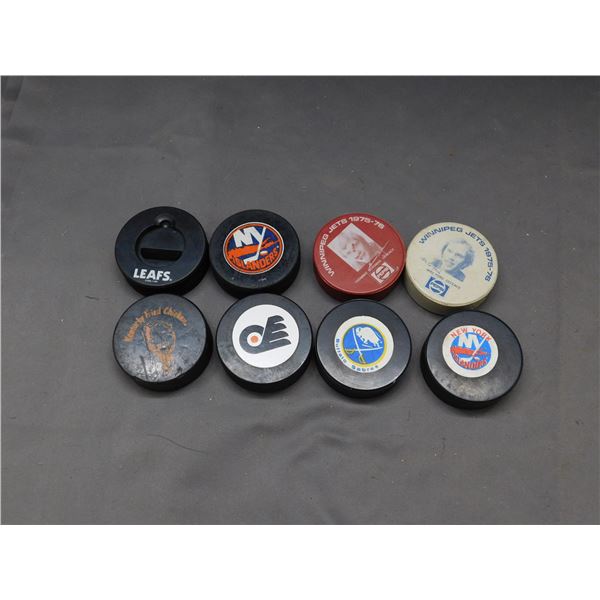 Lot of 8 Hockey Pucks Jets, Islanders, Leafs, Buffalo Sabres, KFC