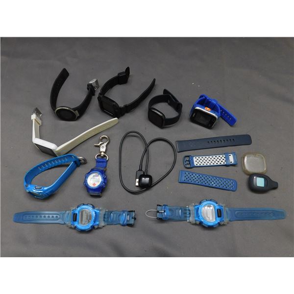 Lot of Fit Bit Exercise Watches, Etc