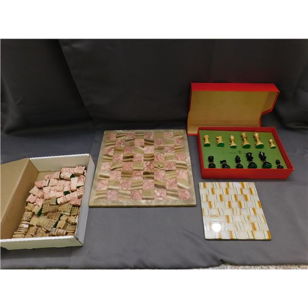 2 Stone Chess Boards, Stone Pieces and Wooden Carved Pieces.