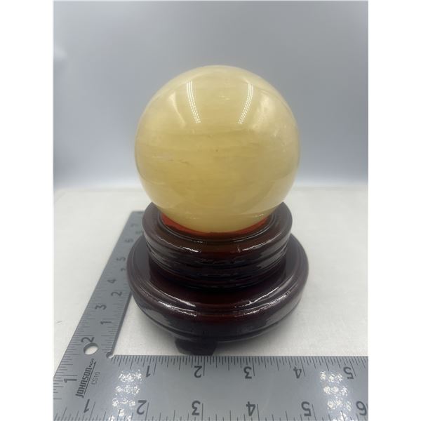 87.3 MM HONEY CALCITE SPHERE WITH STAND
