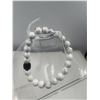 Image 1 : BRAND NEW 8 MM HOWLITE BRACELET ELASTIC
