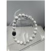 Image 1 : BRAND NEW 8 MM HOWLITE BRACELET ELASTIC
