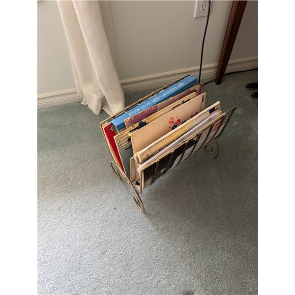 Vintage magazine stand with music books