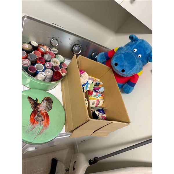 Thread and ribbon and hippopotamus