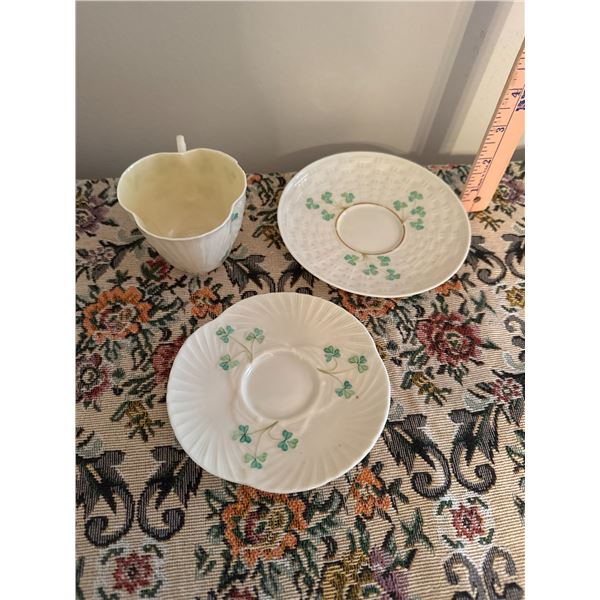 Belleek  saucers and cup cup has cracked