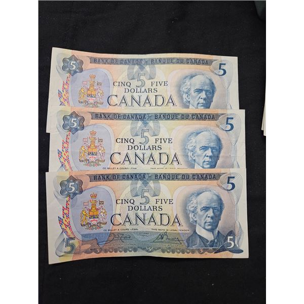 3x $5 Canadian bills
