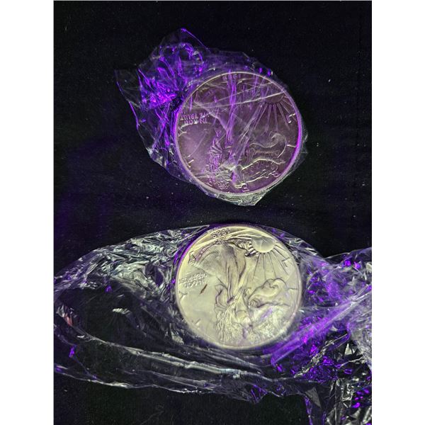 2x $1 silver American coins