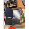 Image 1 : Notebooks and pens