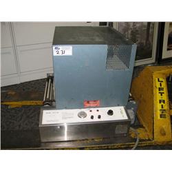 1-  Shrink Wrapper Tunnel With Rolling Table